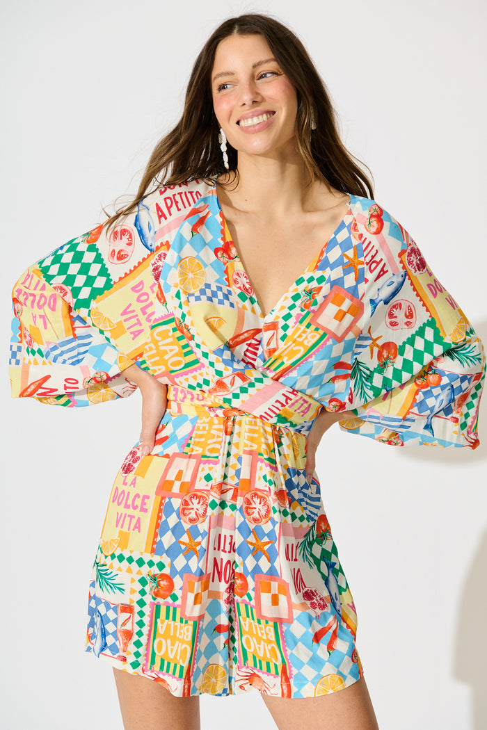 Otillie Playsuit in White Multi Conversational Print detail