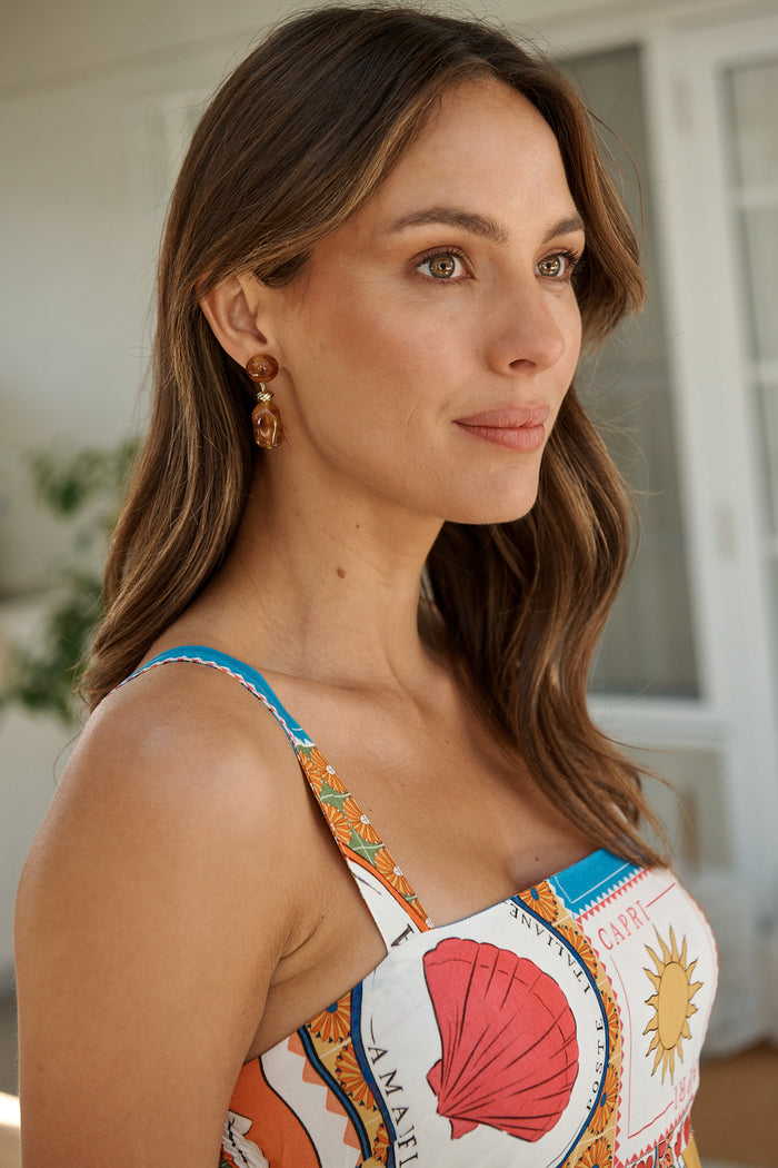 Glow Drop Earrings in Chocolate Resin campaign on model side