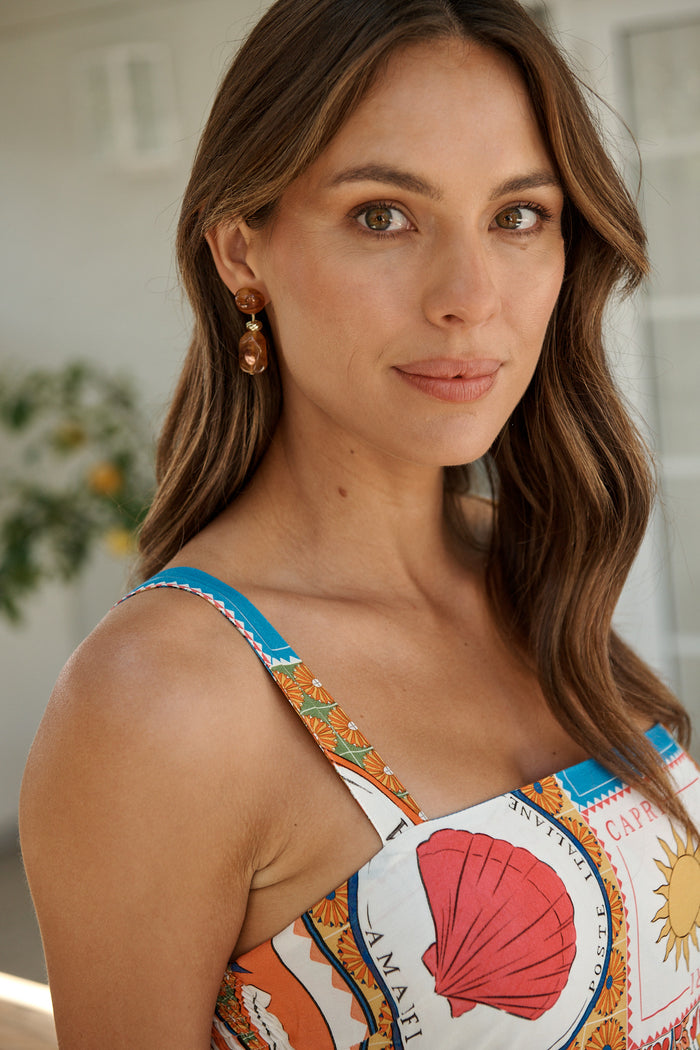Glow Drop Earrings in Chocolate Resin campaign on model side