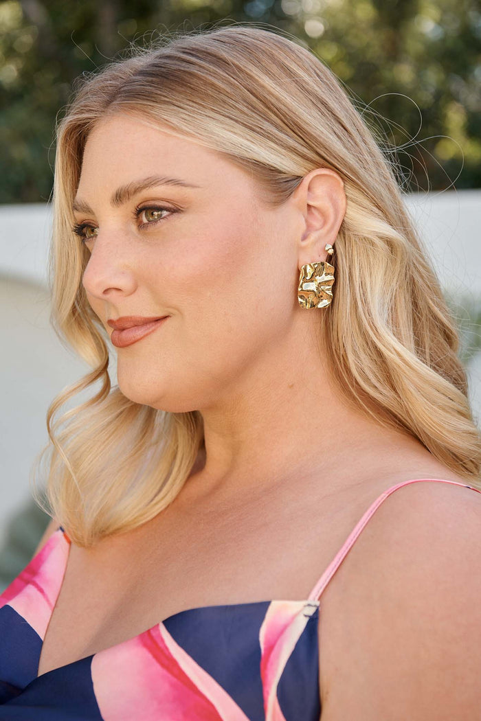 Lola Stud Earrings in Gold campaign on model side