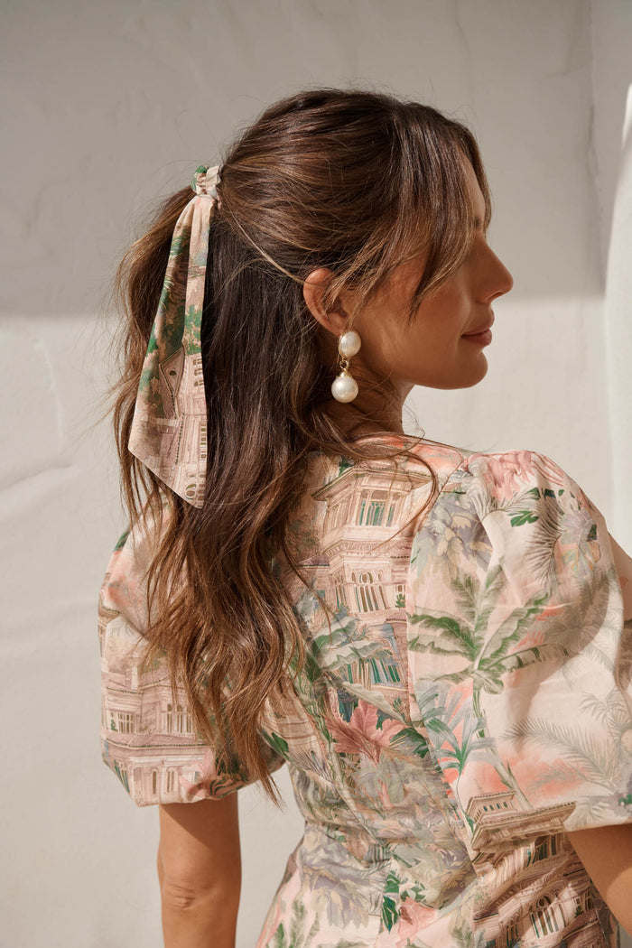 Jody Scrunchie with Tails in Multi Palm Tree Print campaign on model side