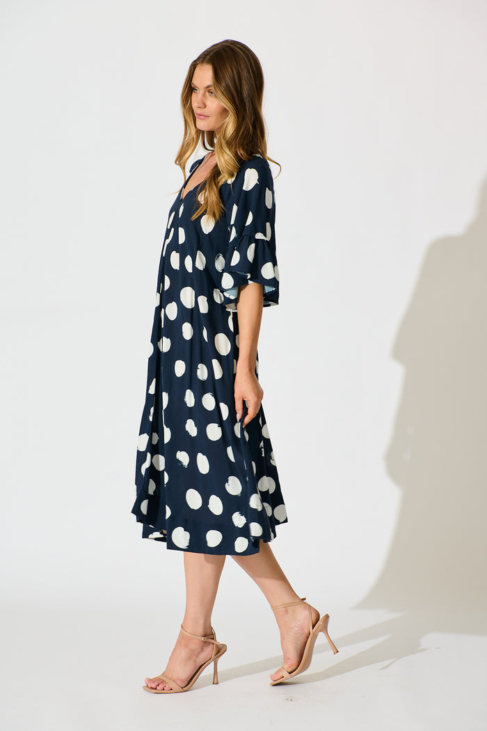 Spot On Dress in Navy with White Spot side