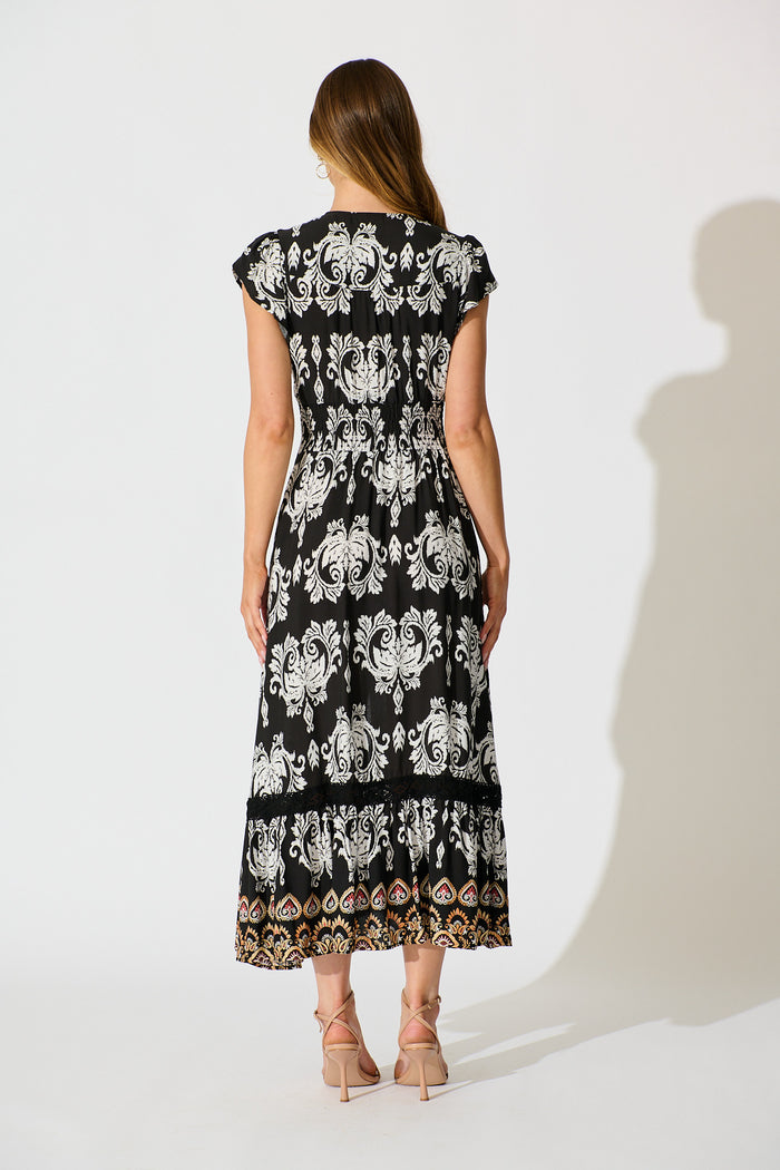 Ilysssa Maxi Dress in Black with White Boho Print back