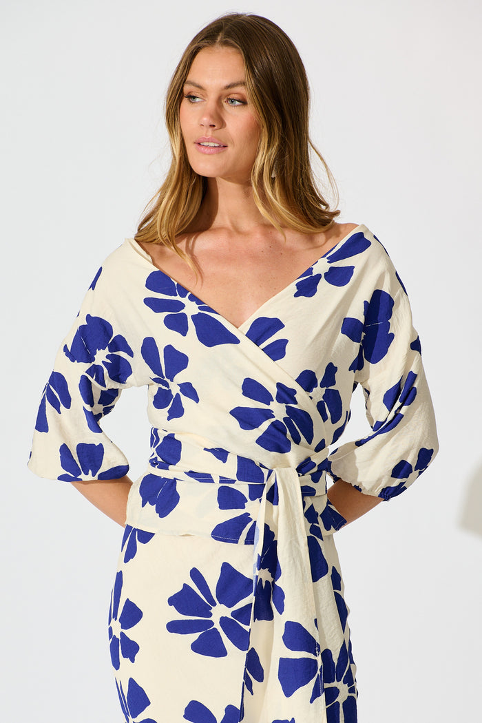 Rhylee Wrap Top in White with Blue Flower Print front