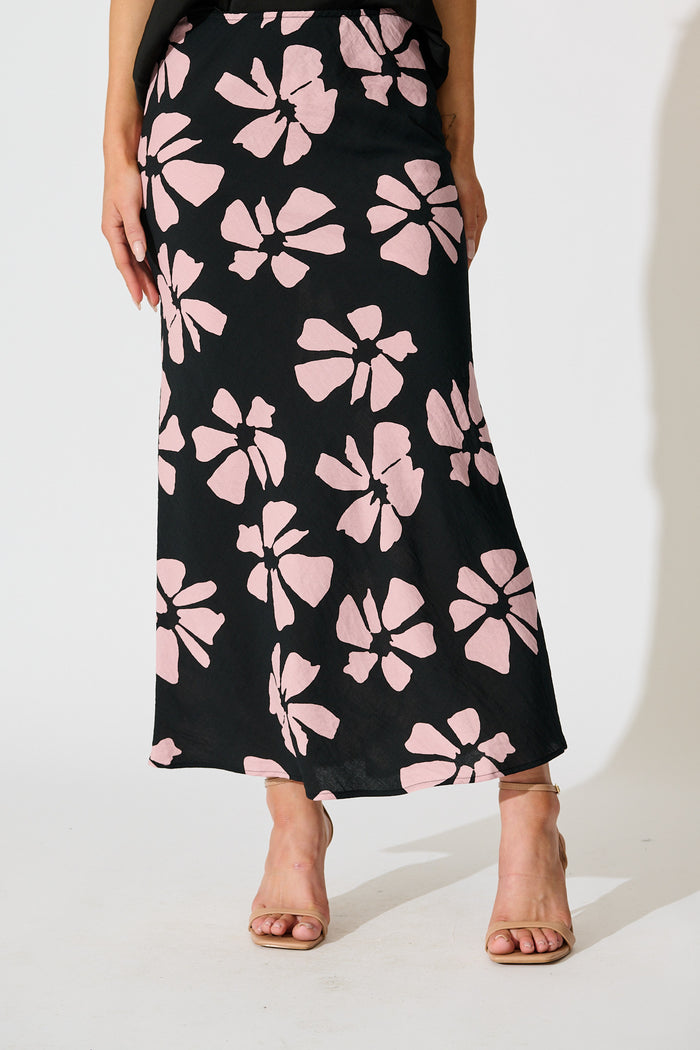 Lanah Maxi Skirt in Black with Pink Flower Print front