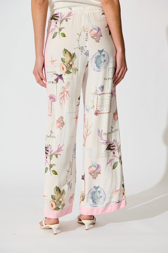 Coastal Charm Pant in White with Multi Shell back