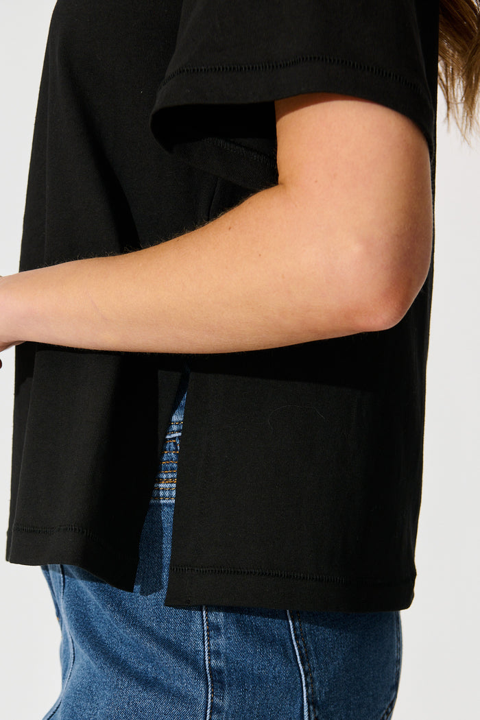 Aveda Off Shoulder T Shirt in Black detail