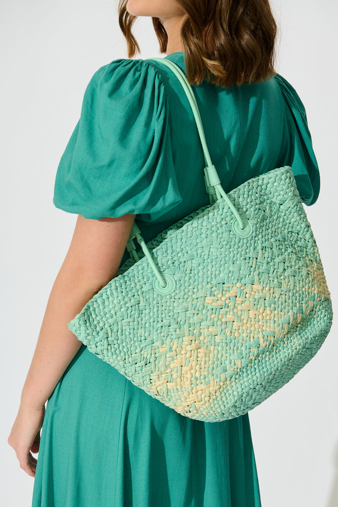 Sorrento Tote Bag in Aqua and Beige Raffia on model back