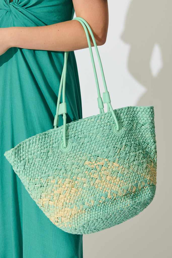 Sorrento Tote Bag in Aqua and Beige Raffia on model front
