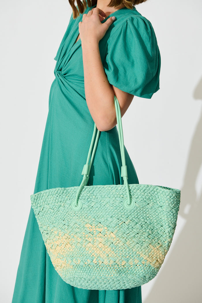 Sorrento Tote Bag in Aqua and Beige Raffia on model side