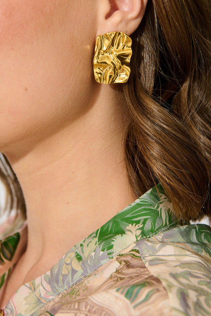 Lola Stud Earrings in Gold on model close up