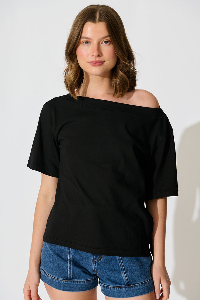 Aveda Off Shoulder T Shirt in Black front off shoulder