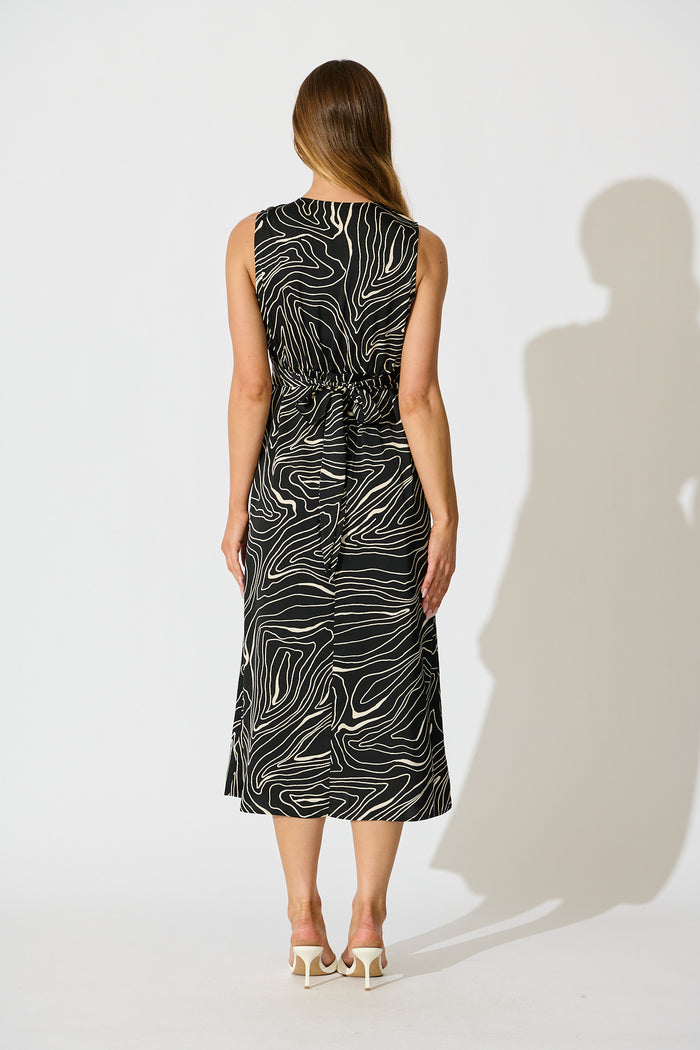 Soraya Midi Dress in Black with White Swirl back