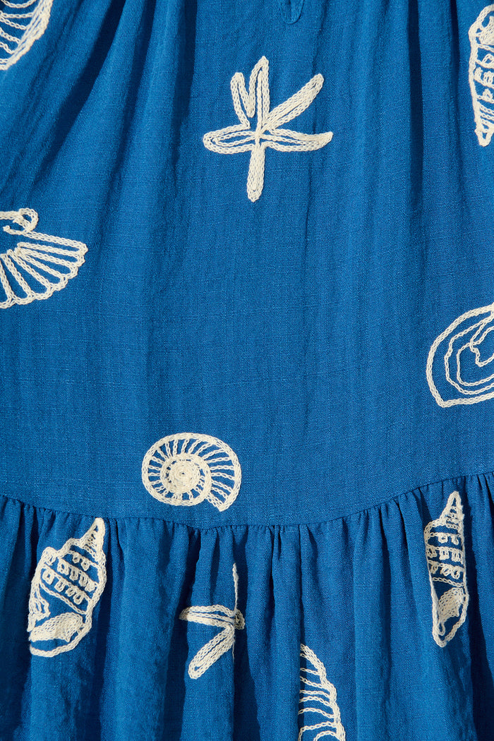 Tahnee Smock Dress in Blue with White Seashell Embroidery fabric
