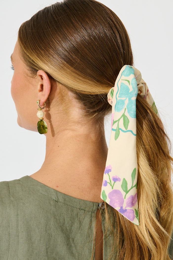 Jody Scrunchie with Tails in Multi Conversational Print on model side