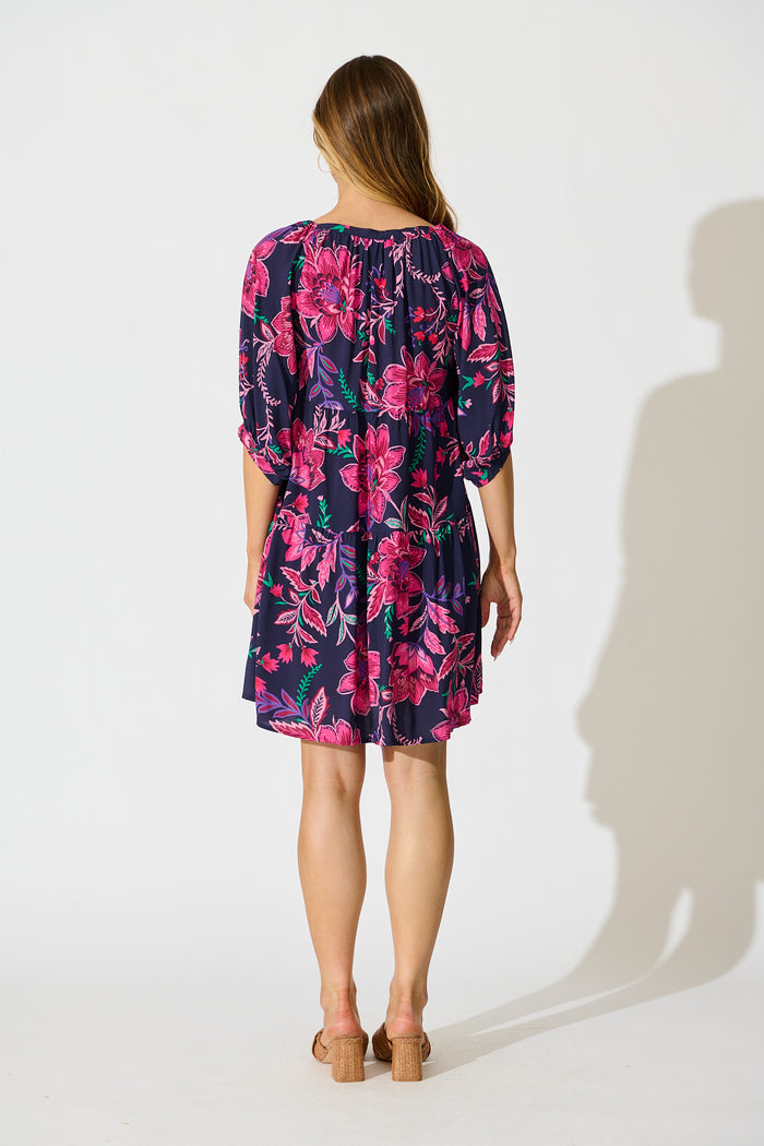 Beryll Smock Dress In Navy with Pink Floral back