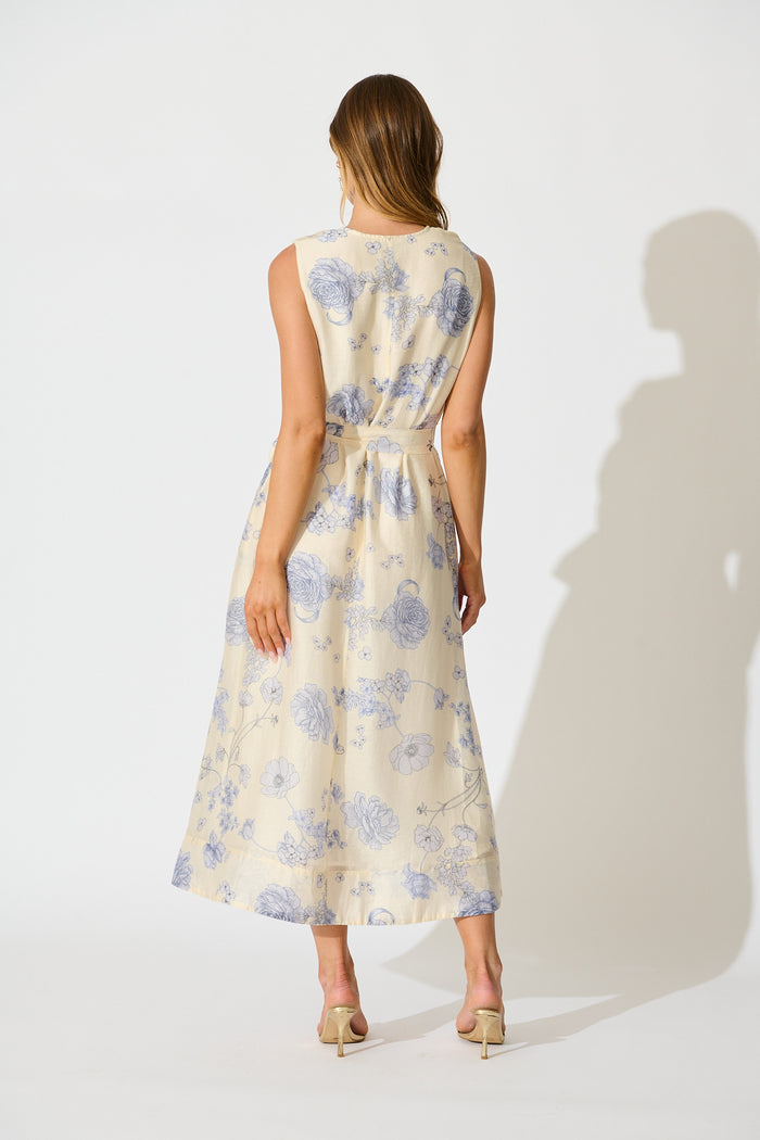 Velaris Midi Dress in Cream with Blue Floral back
