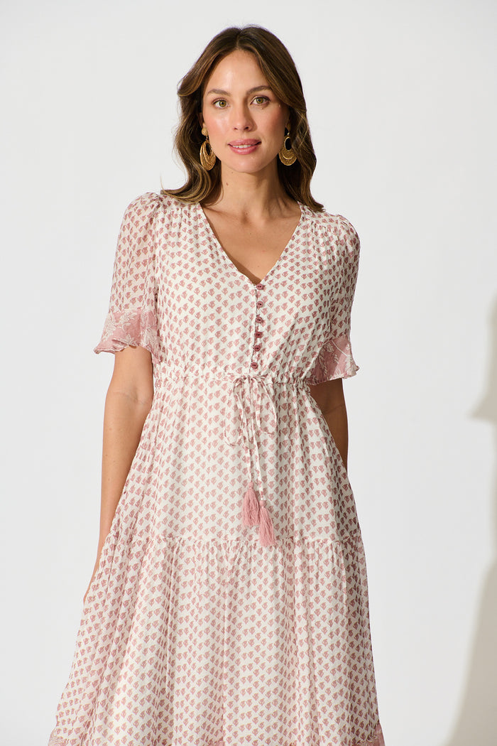 Sheer Allure Midi Dress in White with Blush Print front