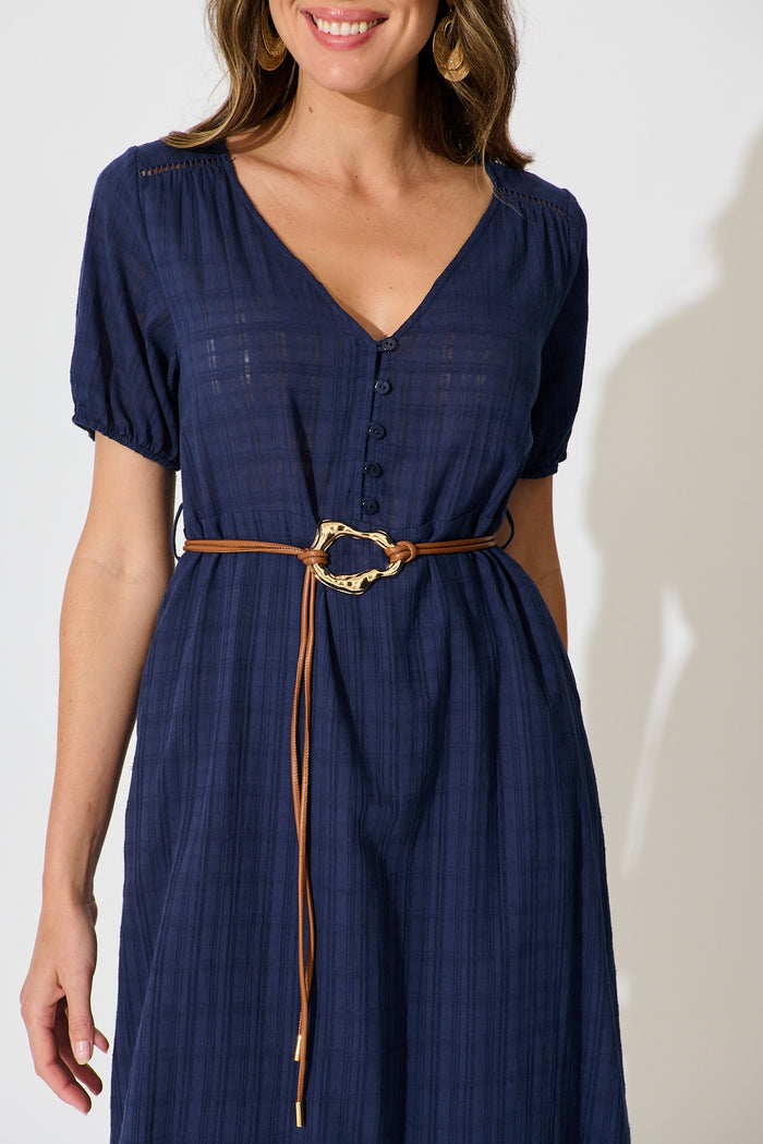 Cleo Belt in Brown with Gold Textured Tie Buckle on model front