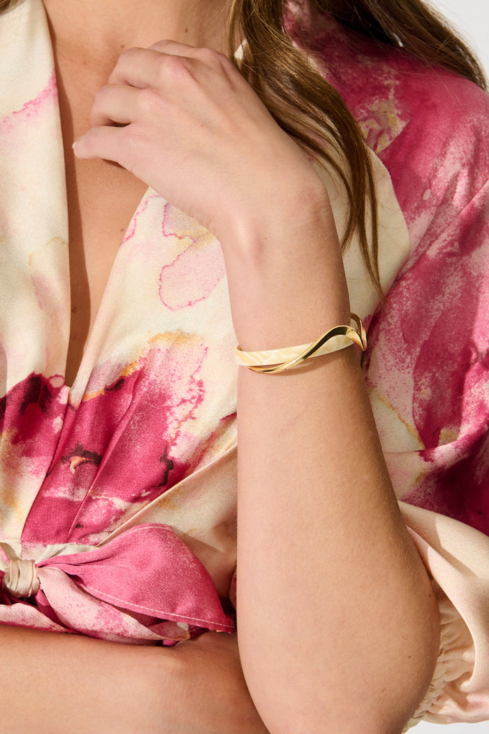 Alessa Open Bangle in Gold with Beige Resin on model close up