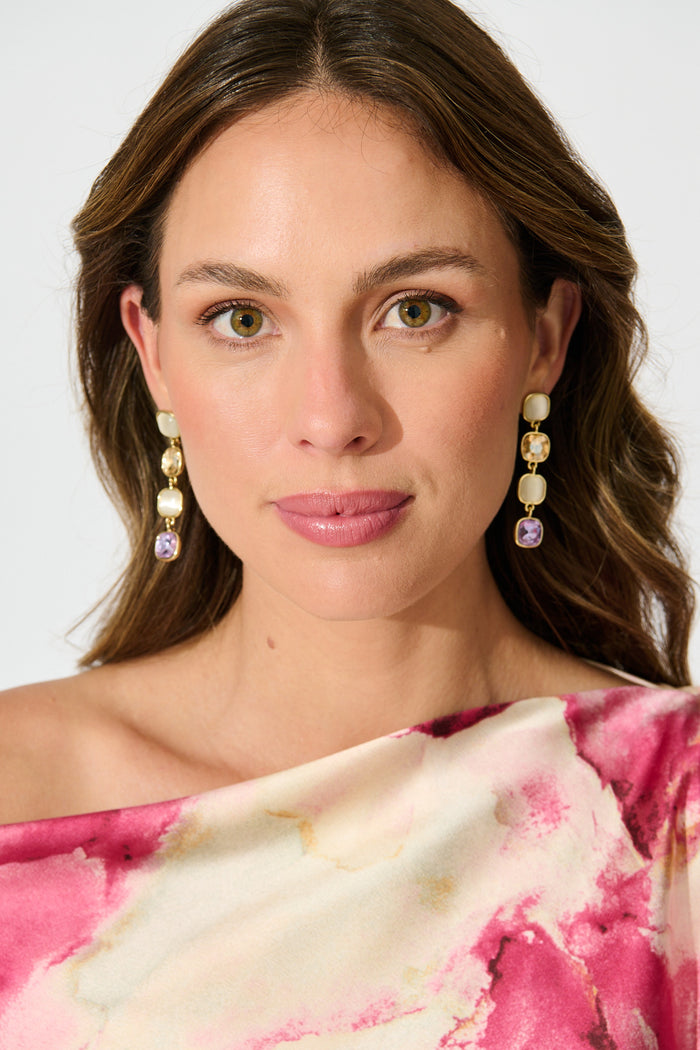 Liana Drop Earrings In Multi Gold on model front