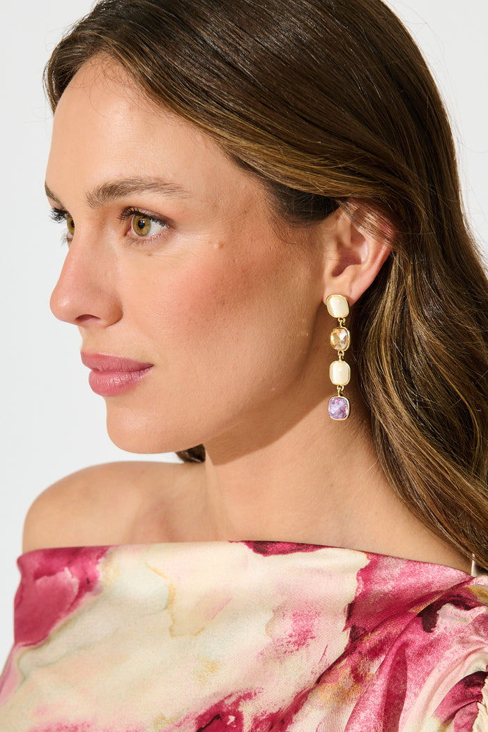 Liana Drop Earrings In Multi Gold on model side
