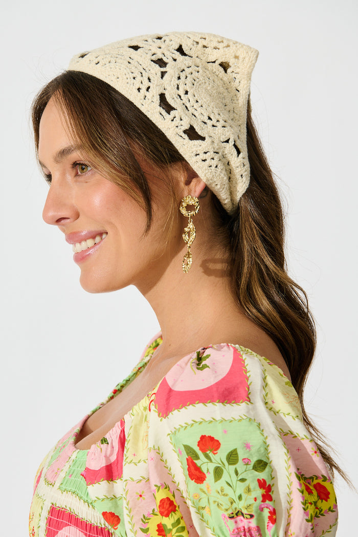 Chiara Crochet Headscarf in Cream on model side