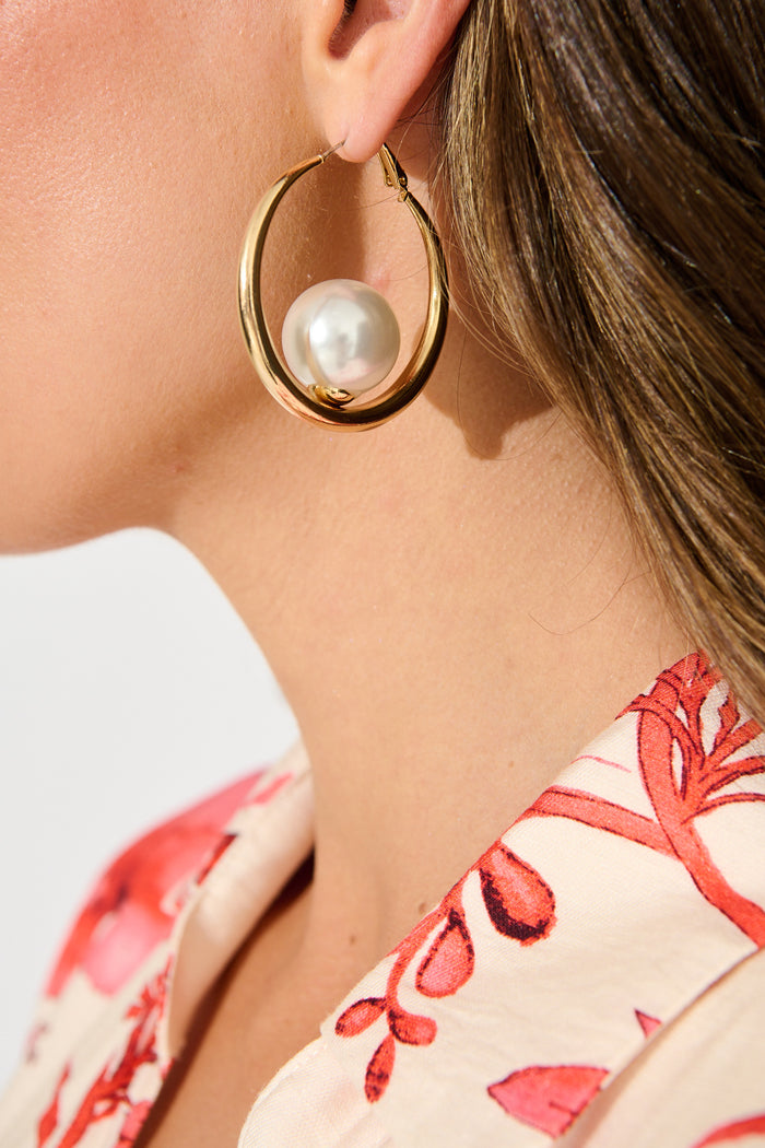 Sandra Hoop Earrings in Gold with Pearl on model close up