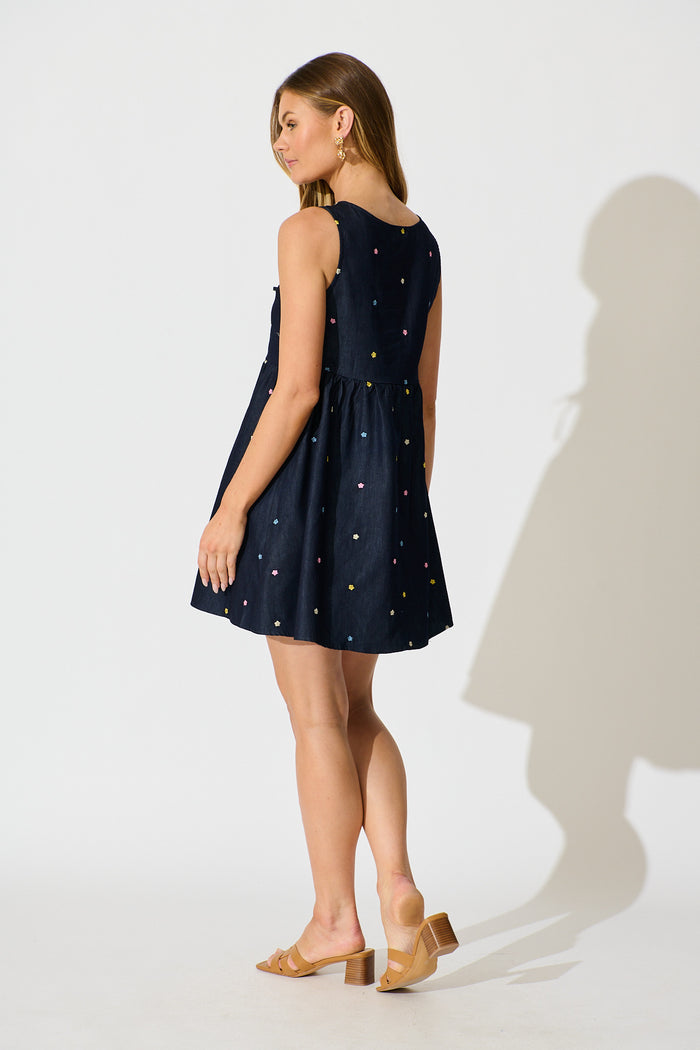 Emika Tie Front Dress in Dark Navy Multi Floral Embroidery Cotton Blend back