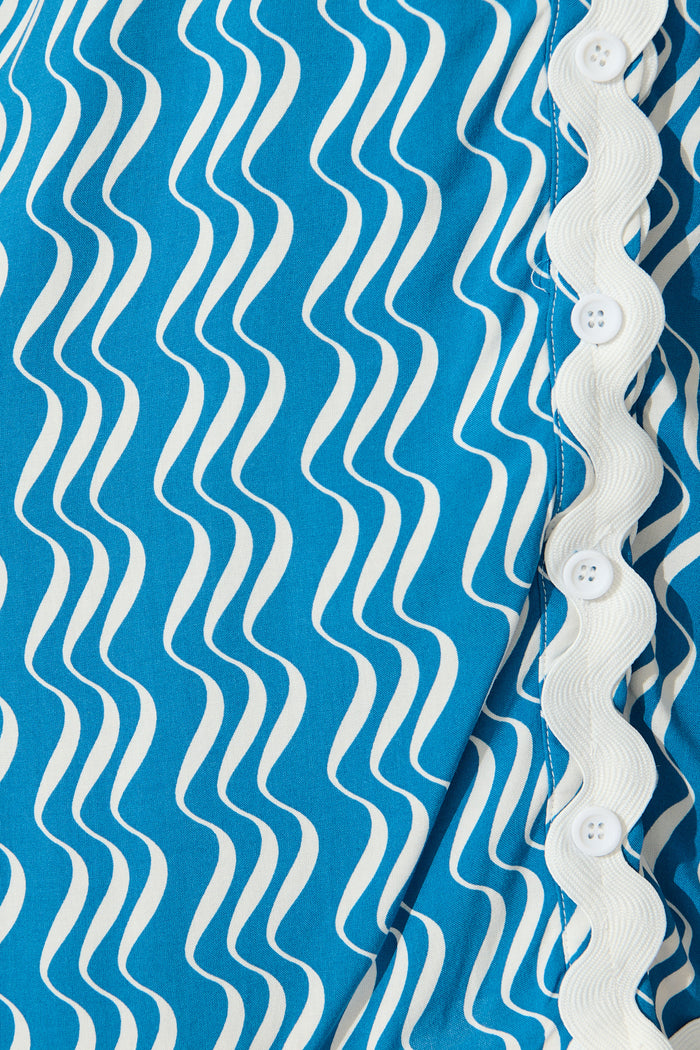 Kimmi Shirt Dress in Blue And White Print With Ric Rac Trim fabric