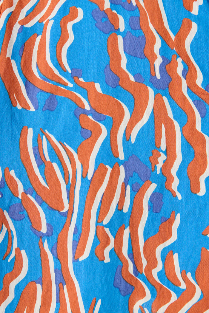 Charmain Dress in Blue with Orange Print fabric