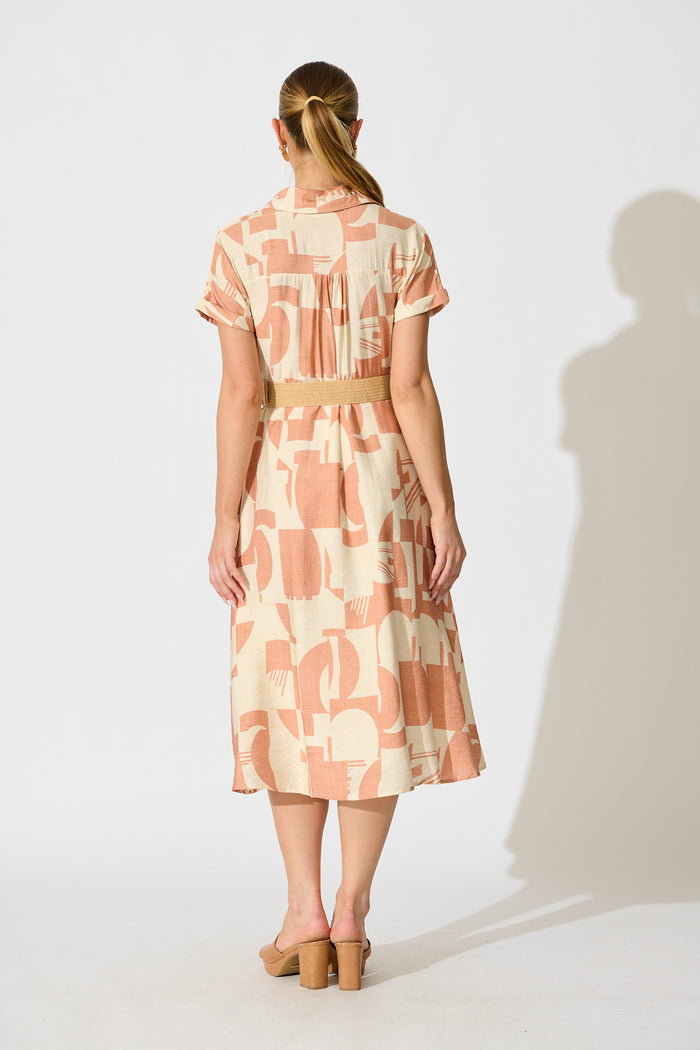 Charli Midi Dress in Rust Geometric Print with Belt back