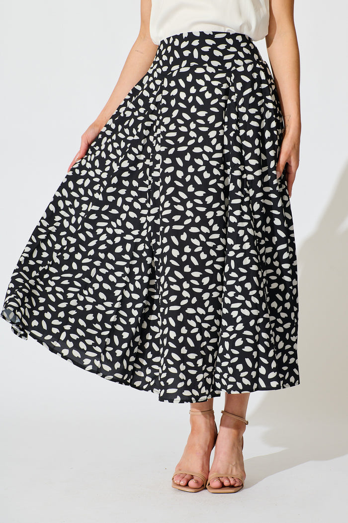 Brandsy Maxi Skirt in Black with White Leaf front
