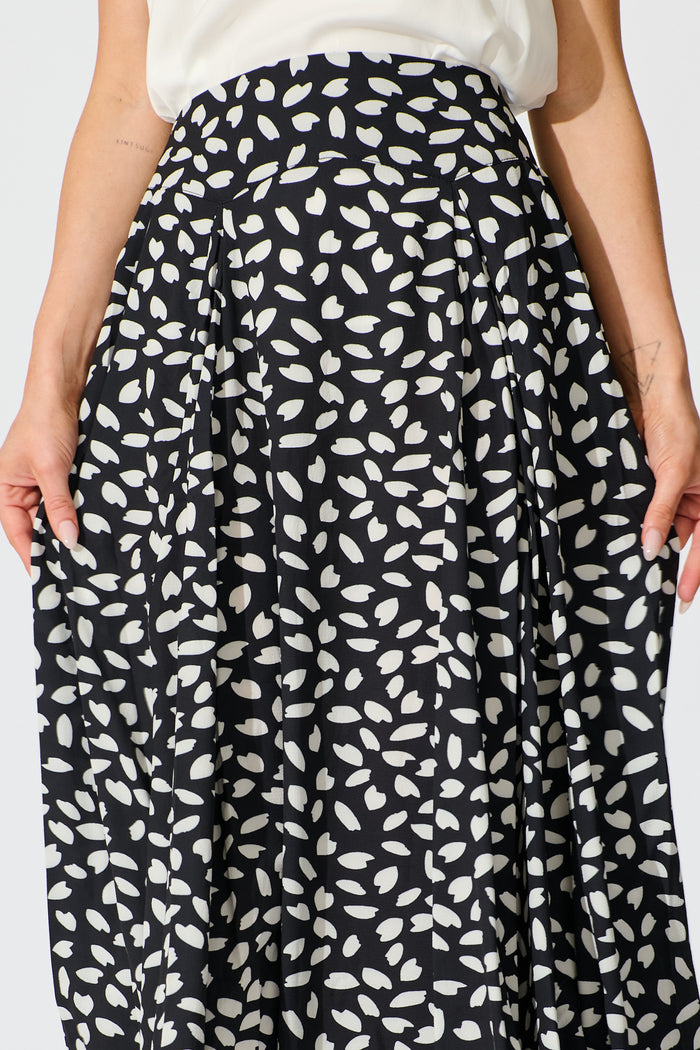 Brandsy Maxi Skirt in Black with White Leaf detail