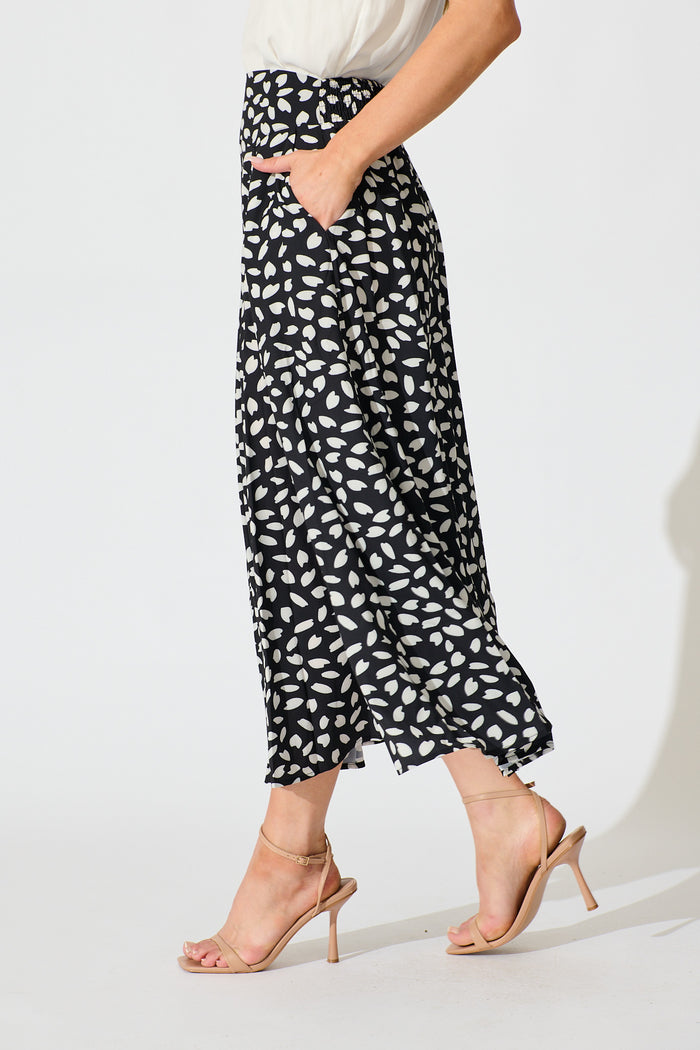 Brandsy Maxi Skirt in Black with White Leaf side