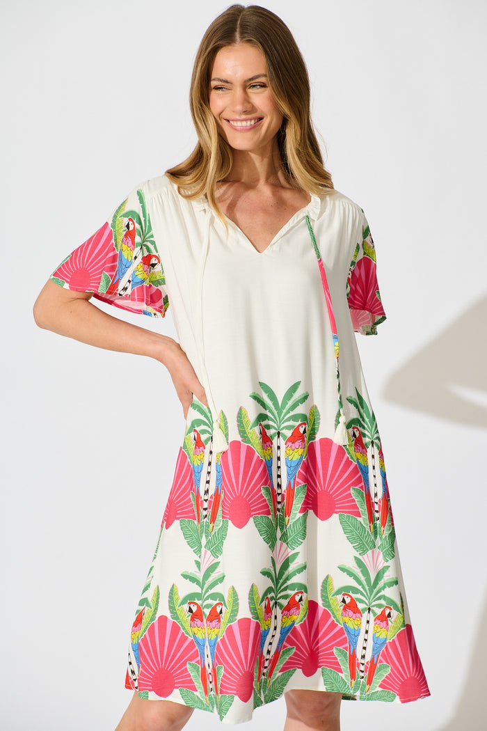 Aere Dress in White with Red Multi Tropical Print front