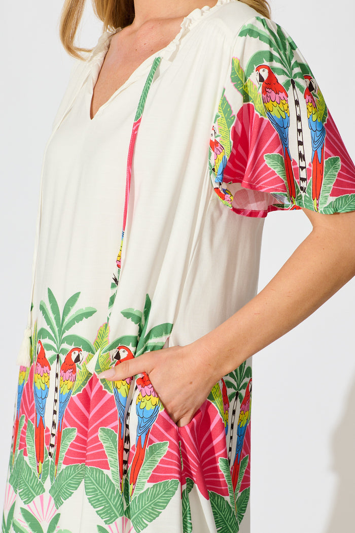 Aere Dress in White with Red Multi Tropical Print detail