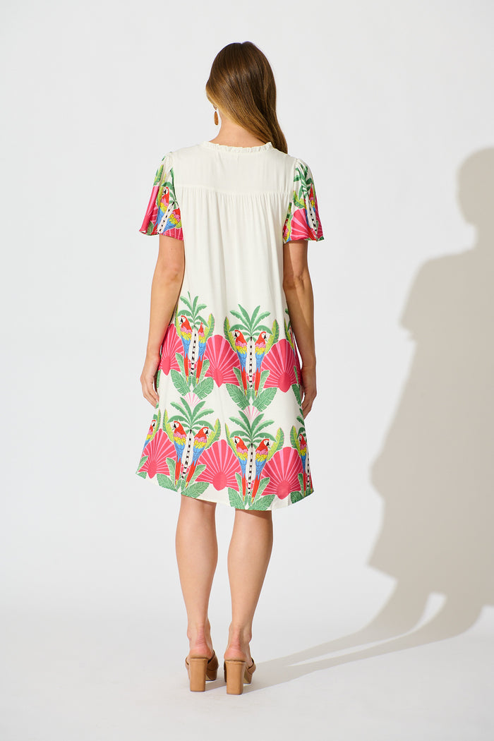 Aere Dress in White with Red Multi Tropical Print back