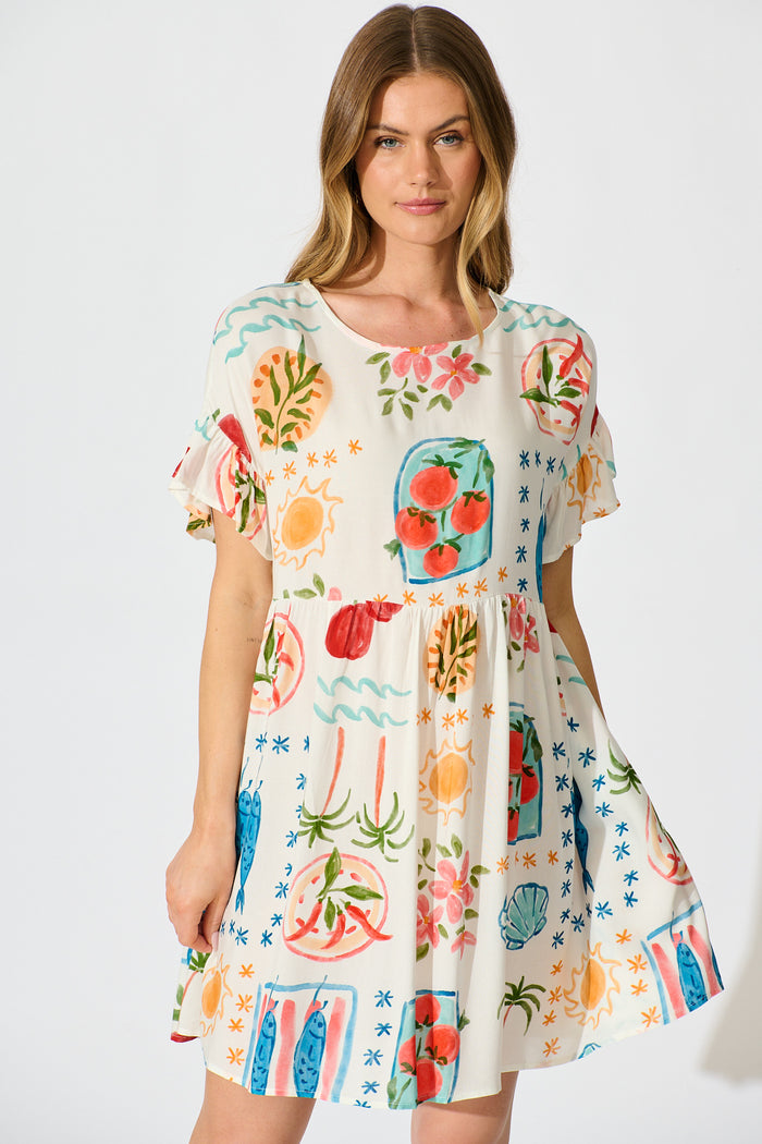 Escape Smock Dress in Cream with Multi Conversational Print front