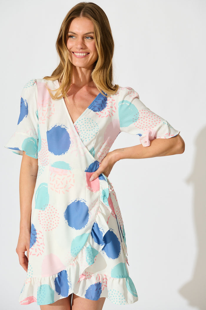 Ariane Wrap Dress In White with Multi Spot Print front