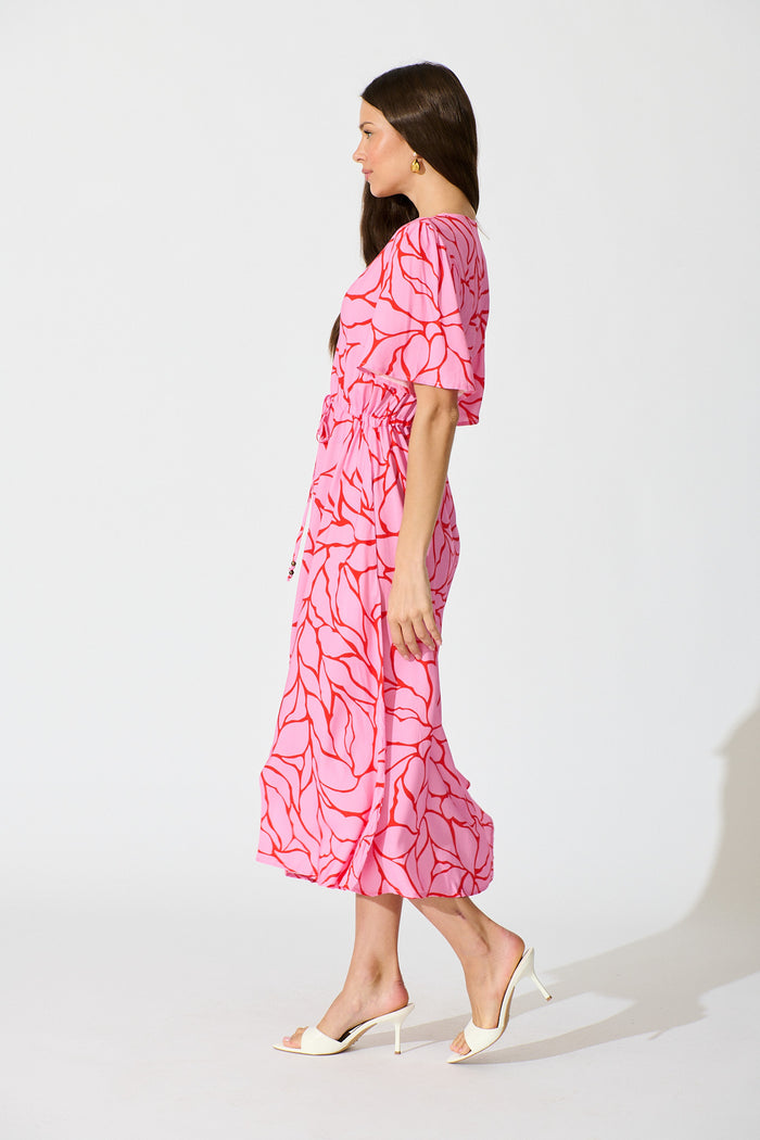 Melody Midi Dress in in Pink Geometric Print side