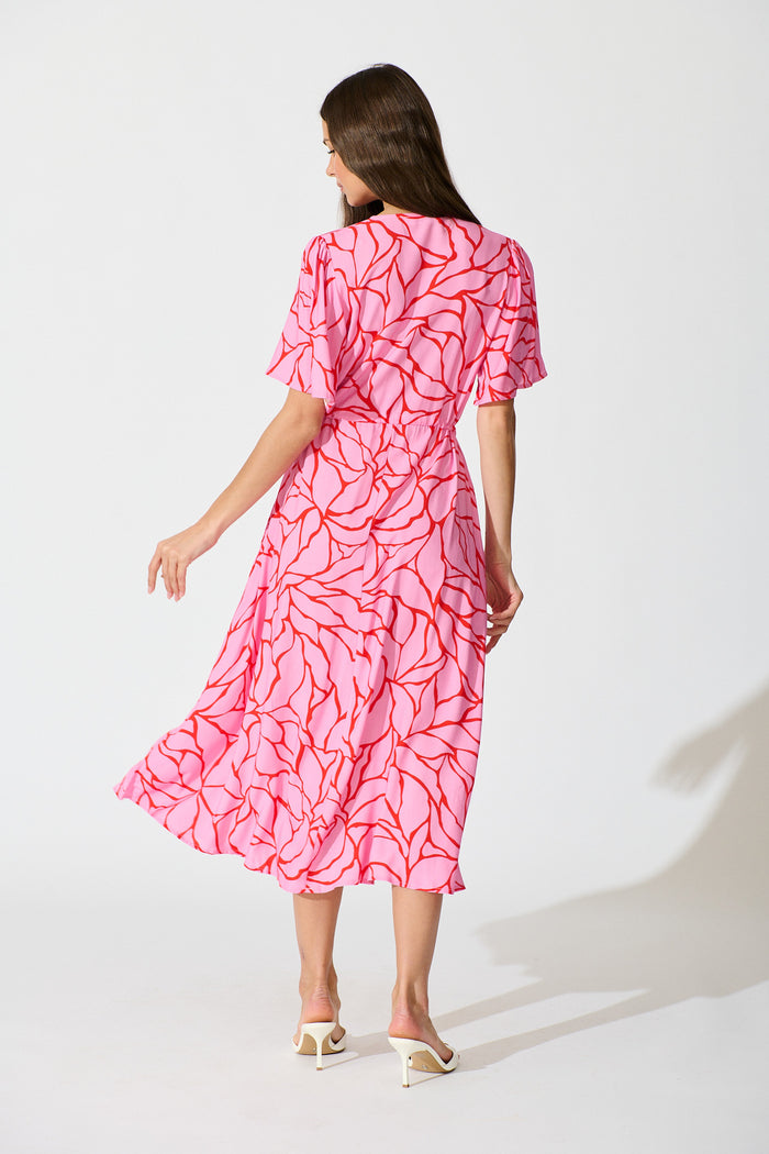Melody Midi Dress in in Pink Geometric Print back