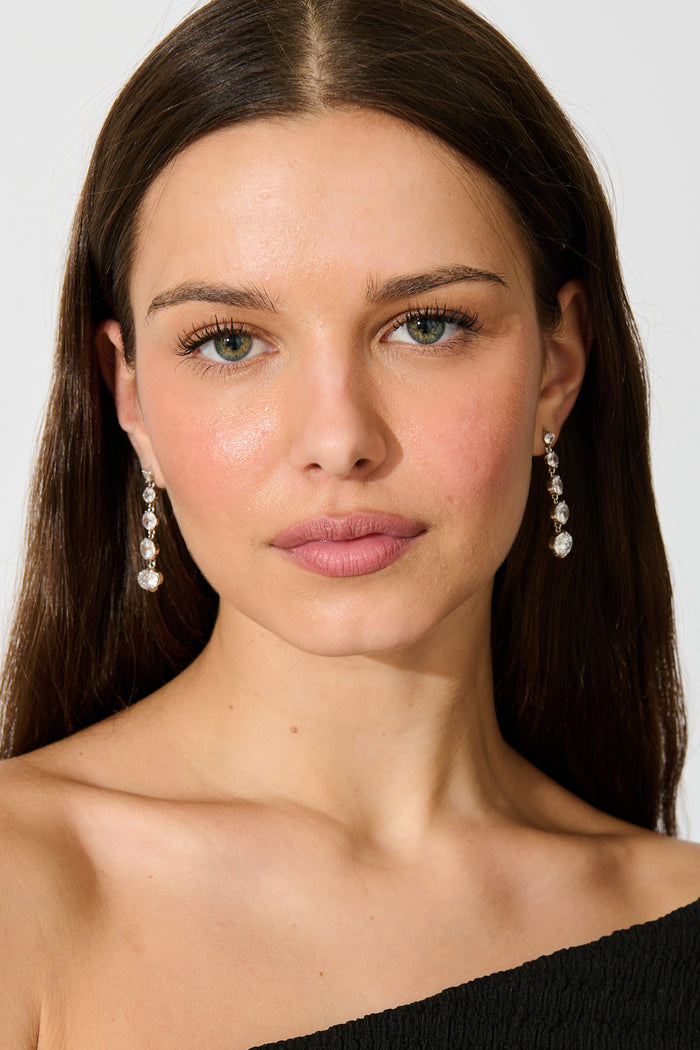 Carlene Drop Earrings in Silver Cubic Zirconia on model front