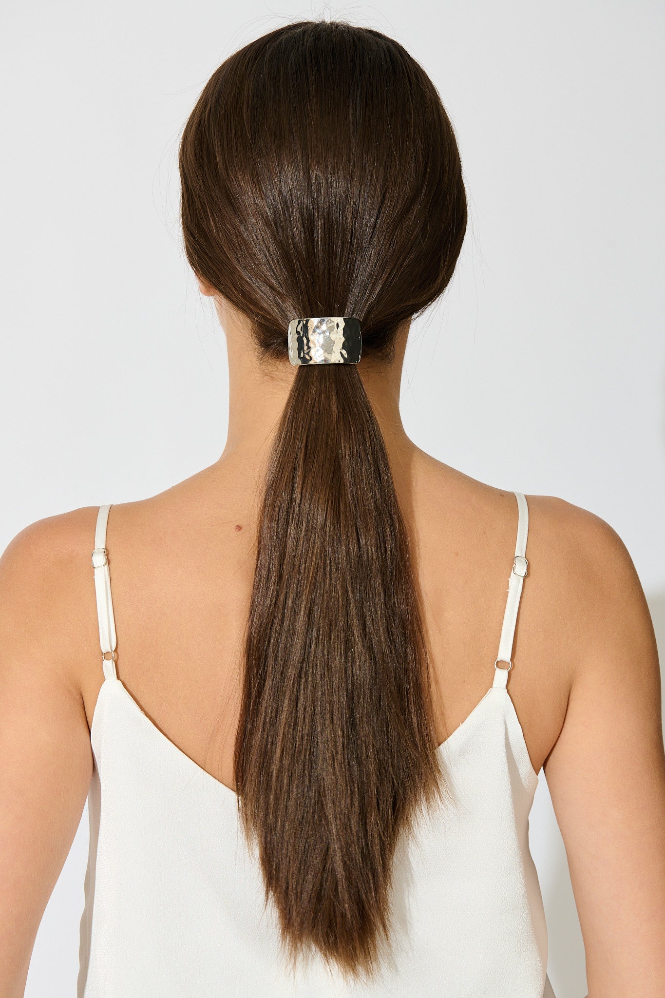 Stania Metal Ponytail Cuff Hair Tie in Textured Silver on model back