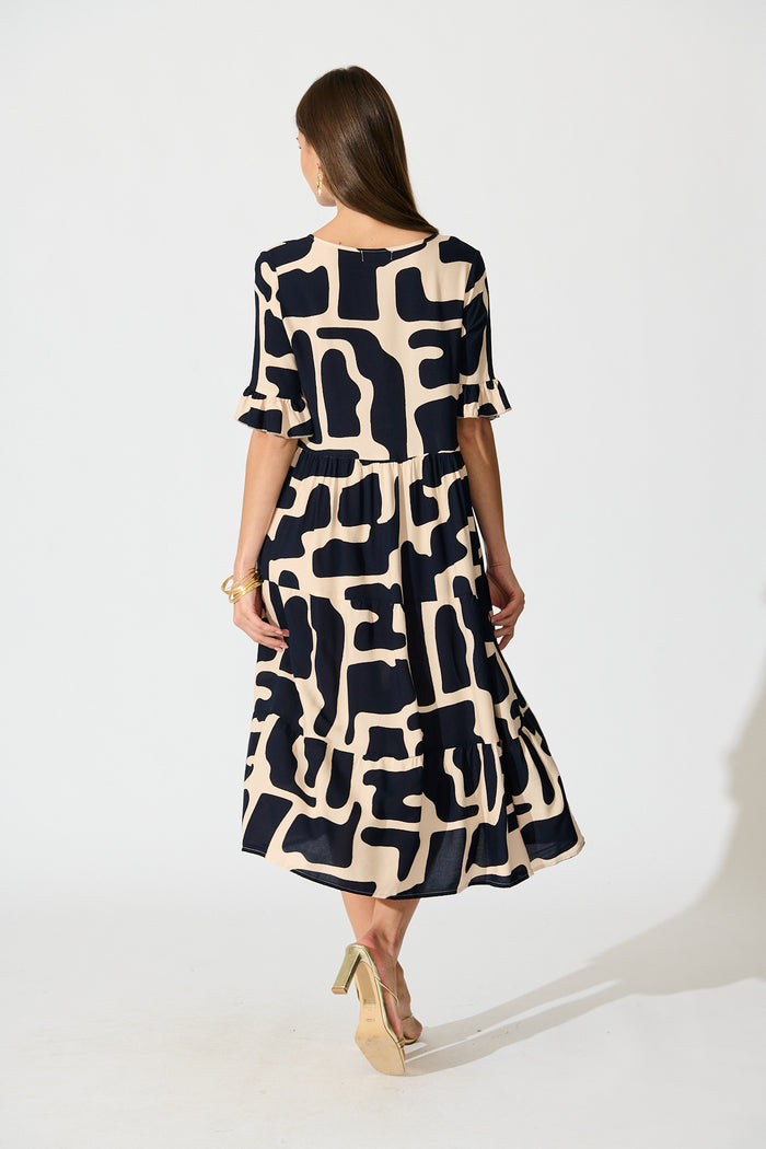Tarah Midi Smock Dress in Black and Beige Geometric Print back