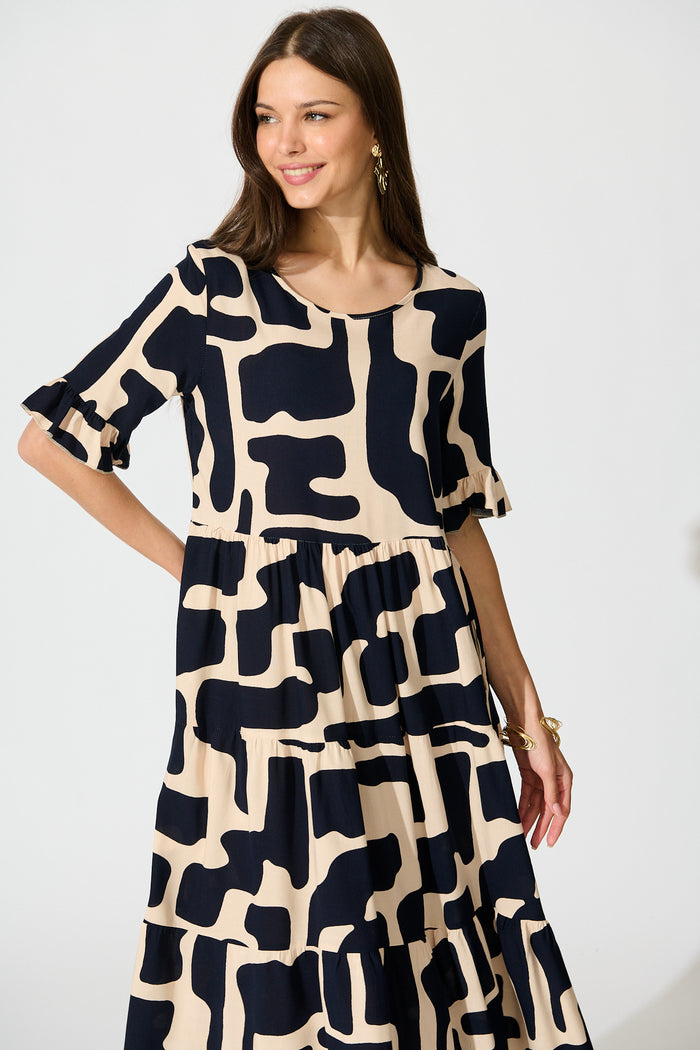 Tarah Midi Smock Dress in Black and Beige Geometric Print front