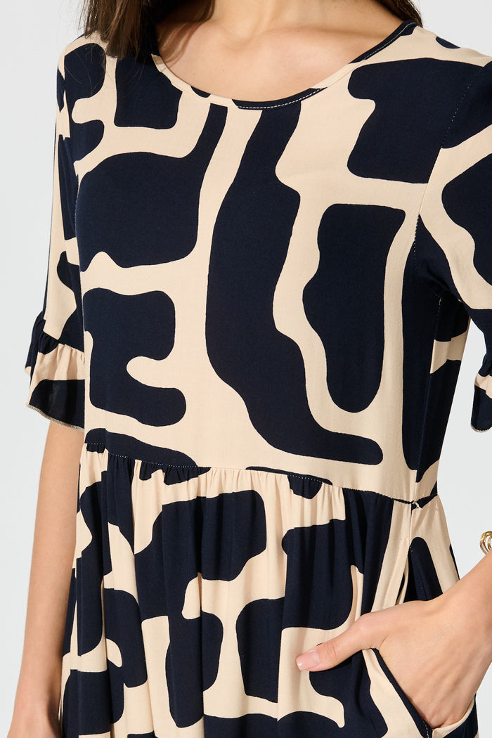 Tarah Midi Smock Dress in Black and Beige Geometric Print detail
