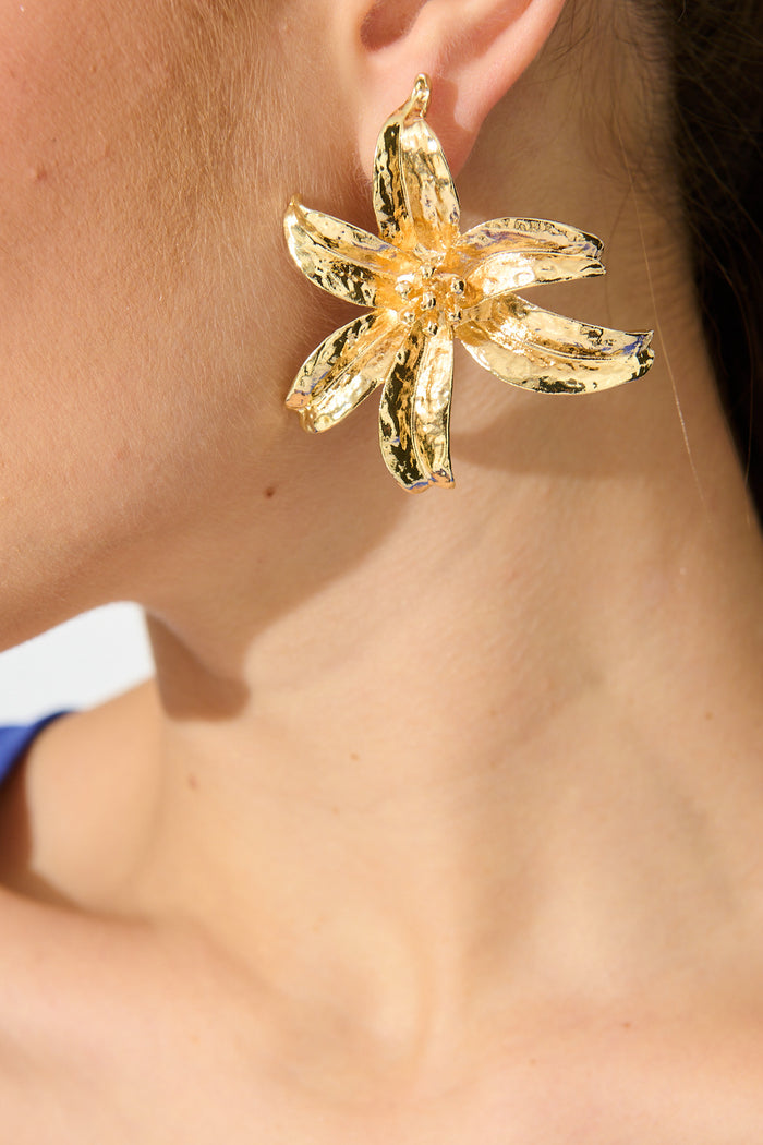 Lianne Lily Stud Earrings in Gold on model close up