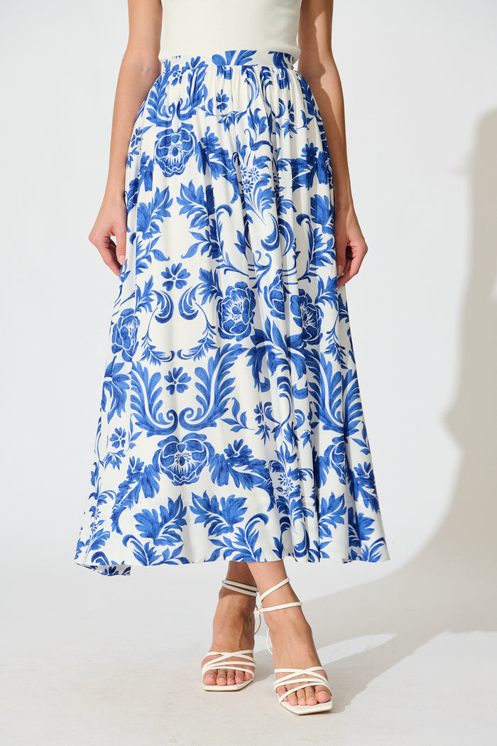 Dip and Dusk Maxi Skirt in White with Blue Floral front