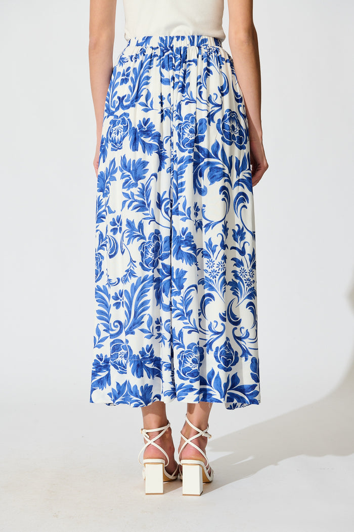 Dip and Dusk Maxi Skirt in White with Blue Floral back